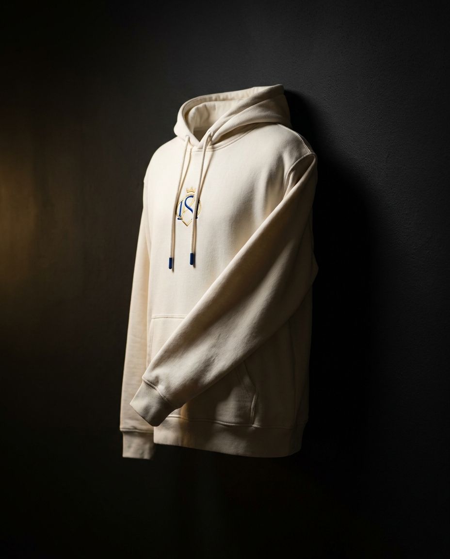 A heavyweight custom hoodie on a form under hard directional light